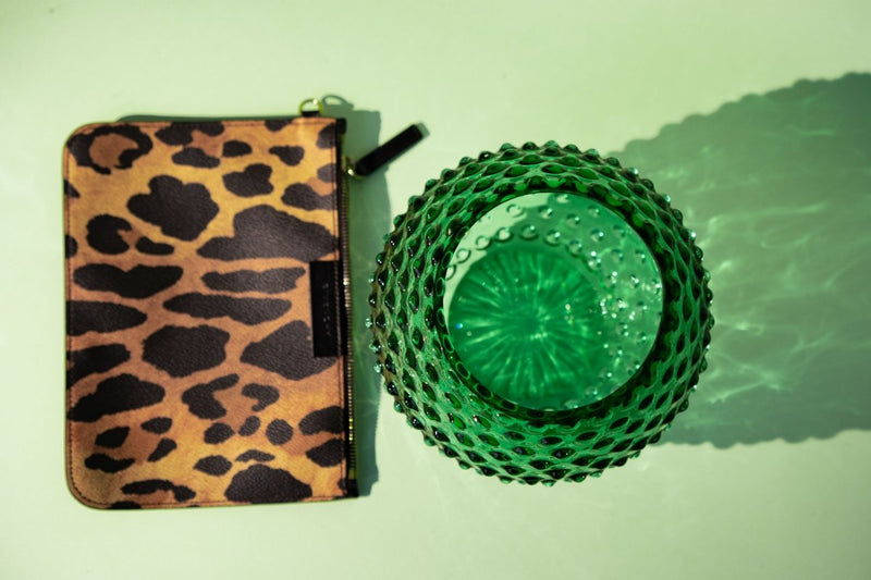 Underlay Dark Green Hobnail Vase with a leopard print pouch